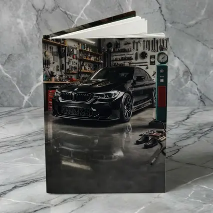 BMW M5 Black Sedan Inside Garage