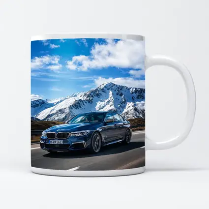 BMW M5 Sedan Speeding Through Alpine Mountains