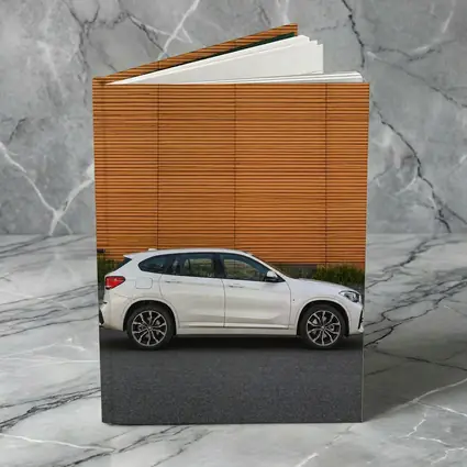 BMW X1 White SUV Orange Wall Background