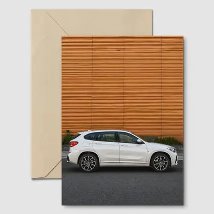 BMW X1 White SUV Orange Wall Background