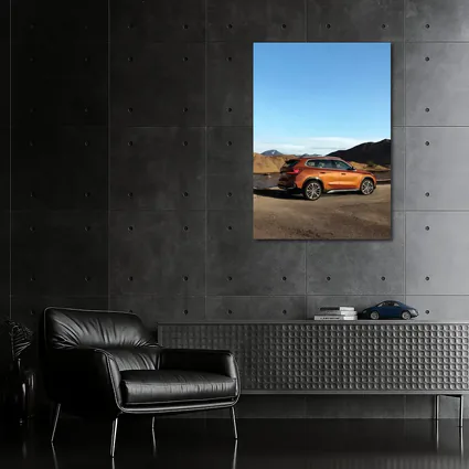 BMW X1 Orange SUV Desert Mountain Backdrop