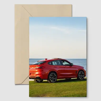BMW X4 M Red Coastal Grass Scene