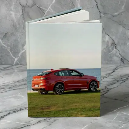 BMW X4 M Red Coastal Grass Setting