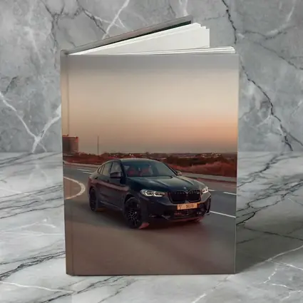 BMW X4 M Black On Open Highway Sunset