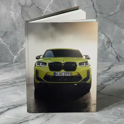 BMW X4 M Yellow Smoke Dramatic Front View