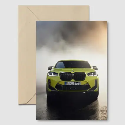 BMW X4 M Yellow Smoke Dramatic Front View