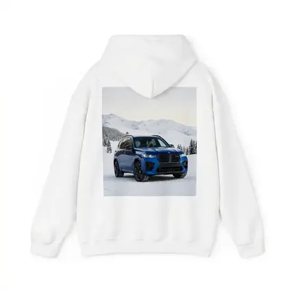BMW X5M Blue SUV Snowy Mountain Setting