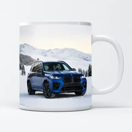 BMW X5M Blue SUV Snowy Mountain Setting