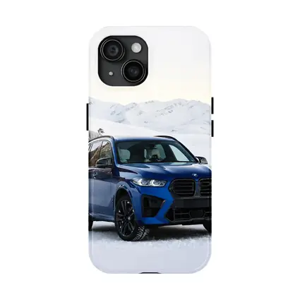 BMW X5M Blue SUV Snowy Mountain Setting