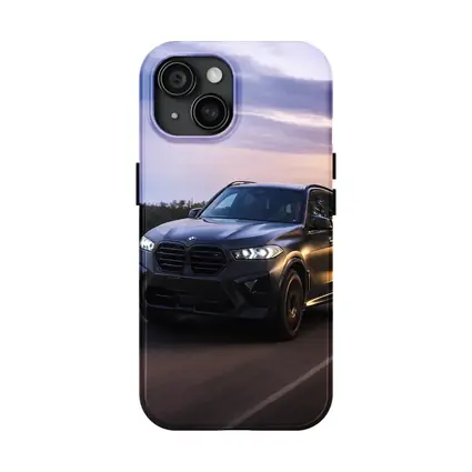 BMW X5M Matte Black Driving Sunset Road