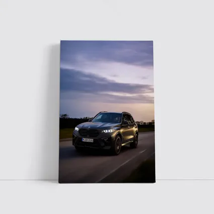 BMW X5M Black SUV Dusk Road Drive