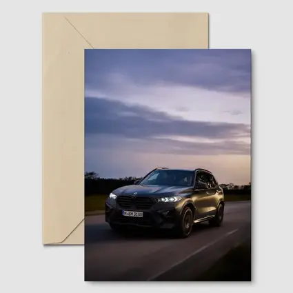 BMW X5M Black SUV Dusk Road Drive