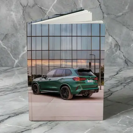 BMW X5M Competition Dark Green Glass Building