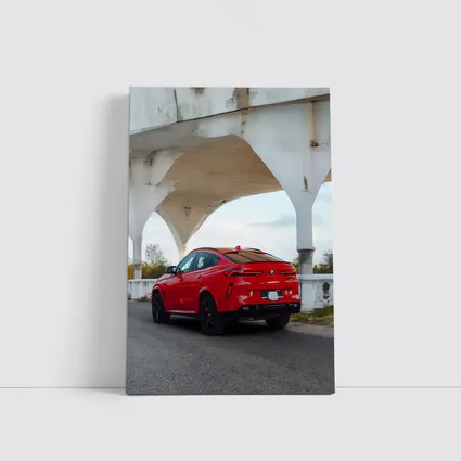 BMW X6 Red Under Concrete Bridge