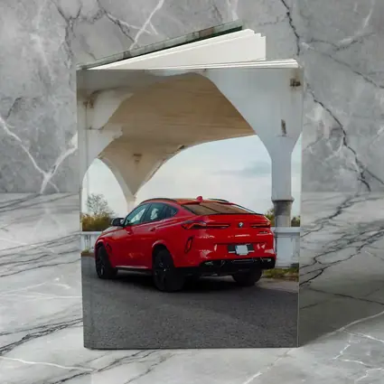 BMW X6 Red Under Concrete Bridge