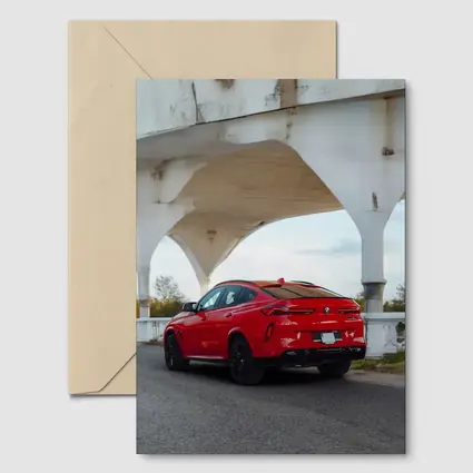 BMW X6 Red Under Concrete Bridge