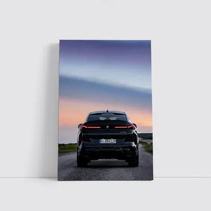BMW X6M Black Rear Sunset Road