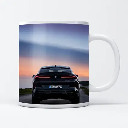 BMW X6 M Black Rear Sunset Road