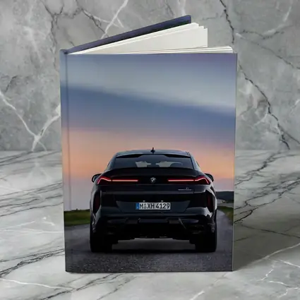 BMW X6 M Black Rear Sunset Road