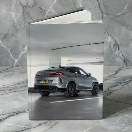 BMW X6M Gray Parked In Parking Garage