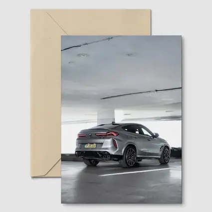 BMW X6M Gray Parked In Parking Garage