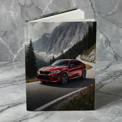 BMW X6M Red on Mountain Road