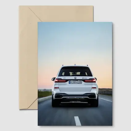 BMW X7 M50i White Highway Sunset Drive
