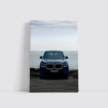 BMW XM Front View Ocean Background