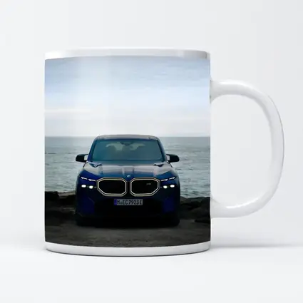 BMW XM Front View Ocean Background