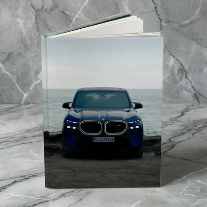 BMW XM Front View Ocean Background