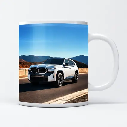 BMW XM SUV on Mountain Highway Road