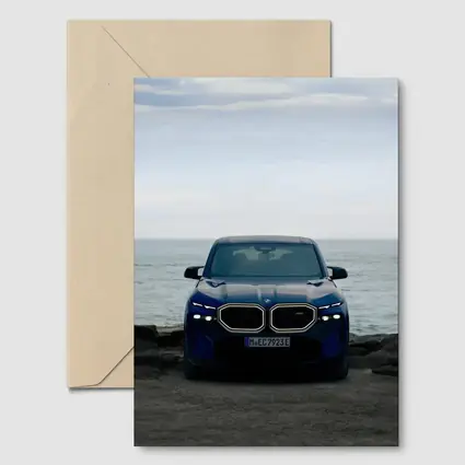 BMW XM Front View Ocean Background