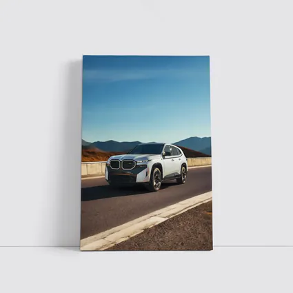 BMW XM White SUV Mountain Highway Drive