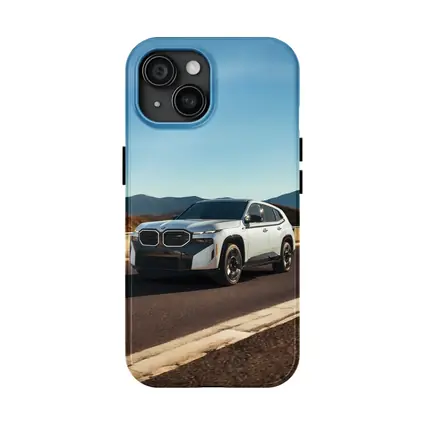 BMW XM White SUV Mountain Highway Drive