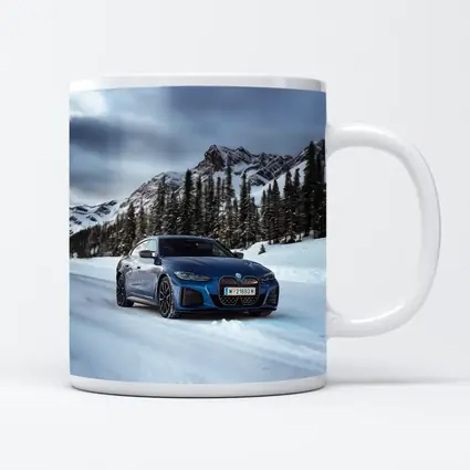 BMW i4 M50 Blue Snow Mountain Road