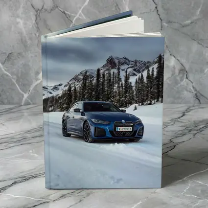 BMW i4 M50 Blue Snow Mountain Road