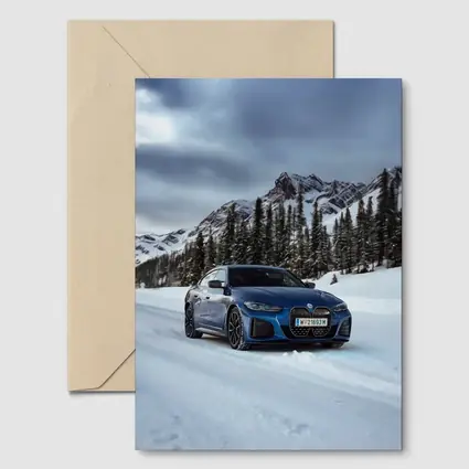 BMW i4 M50 Blue Snow Mountain Road
