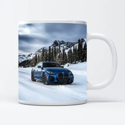 BMW i4 M50 Blue Snow Mountain Road