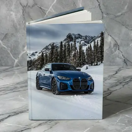 BMW i4 M50 Blue Snow Mountain Road