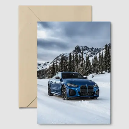BMW i4 M50 Blue Snow Mountain Road