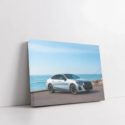 BMW i5 Silver Sedan By The Ocean