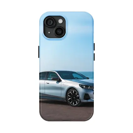 BMW i5 Silver Sedan By The Ocean
