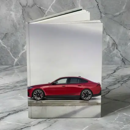 BMW i5 M60 Red Sedan Studio Shot