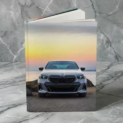 BMW i5 M60 Sedan Coastal Sunset View