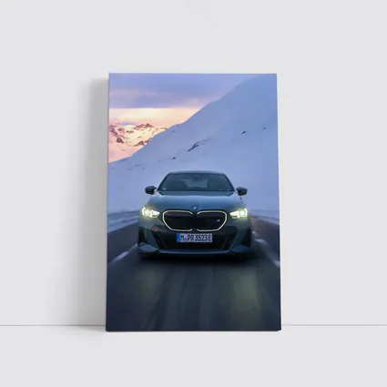 BMW i5 M60 Sedan Snowy Mountain Road