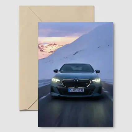 BMW i5 M60 Sedan Snowy Mountain Road
