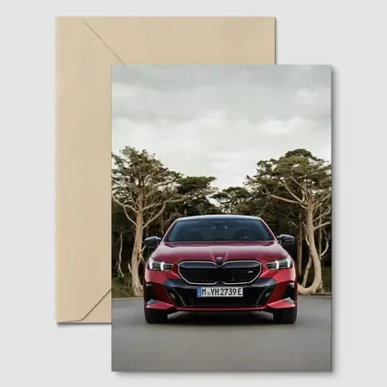 BMW i5 M60 Red Sedan Forest Road