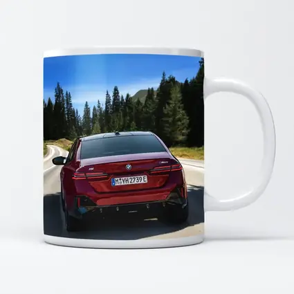 BMW i5 M60 Red Sedan Mountain Road