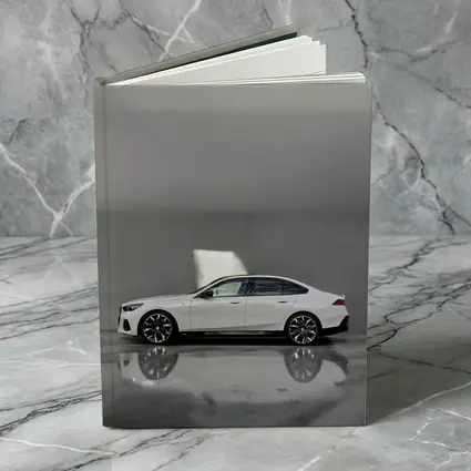 BMW i5 Sedan White Minimalist Concrete Setting