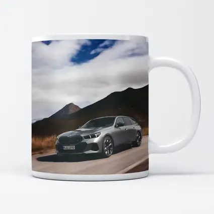BMW i5 Touring Gray Mountain Road Drive